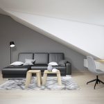 Dizajnérsky návrh obývačky v podkroví, pohľad na čiernu sedačku a pracovný kútik