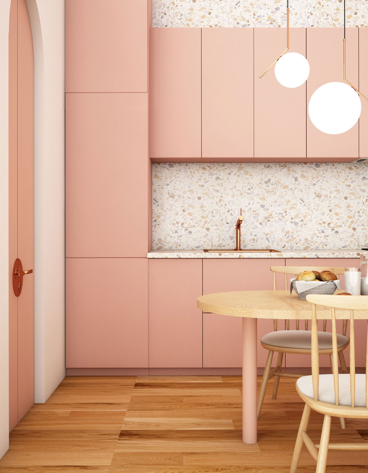 farebná kuchynská linka v minimalistickom dizajne, otváranie dvierok funguje na push systém, kuchyňa je v pastelovej lososovej farbe, zástena je vo vzore terazza